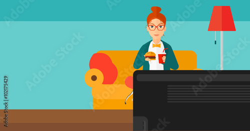Woman eating hamburger. 