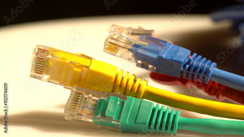 View of different colors computer cables moving from right to left