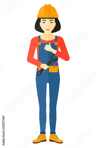 Cheerful repairer with spanner.