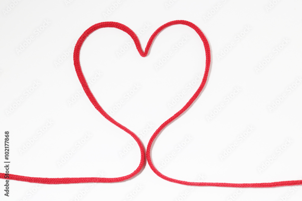 Red heart string on white background
Red heart string on white background