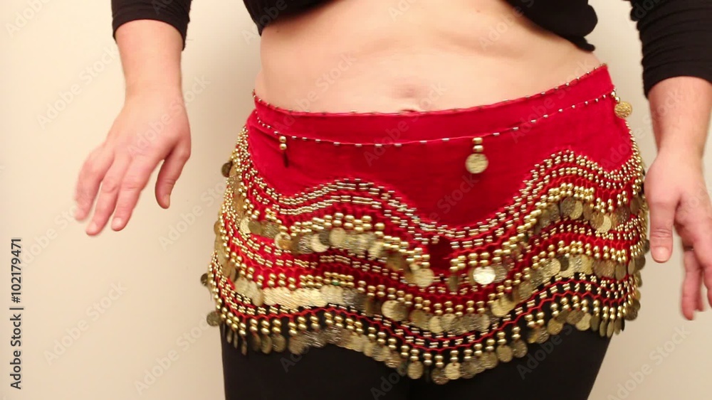 Overweight woman performing belly dance. Weight loss and slimming theme. Lifestyle of plus size people. Overweight woman performing belly dance. Weight loss and slimming theme. Lifestyle of plus size people.