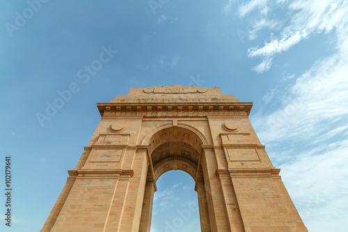 India Gate Memorial In New Delhi, India. On Blue Sky Background