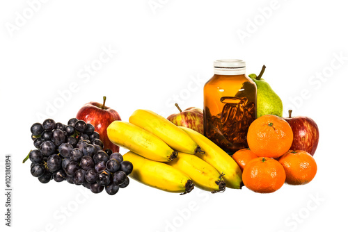 Mix fruit and vitamind D bottle isolated on white background