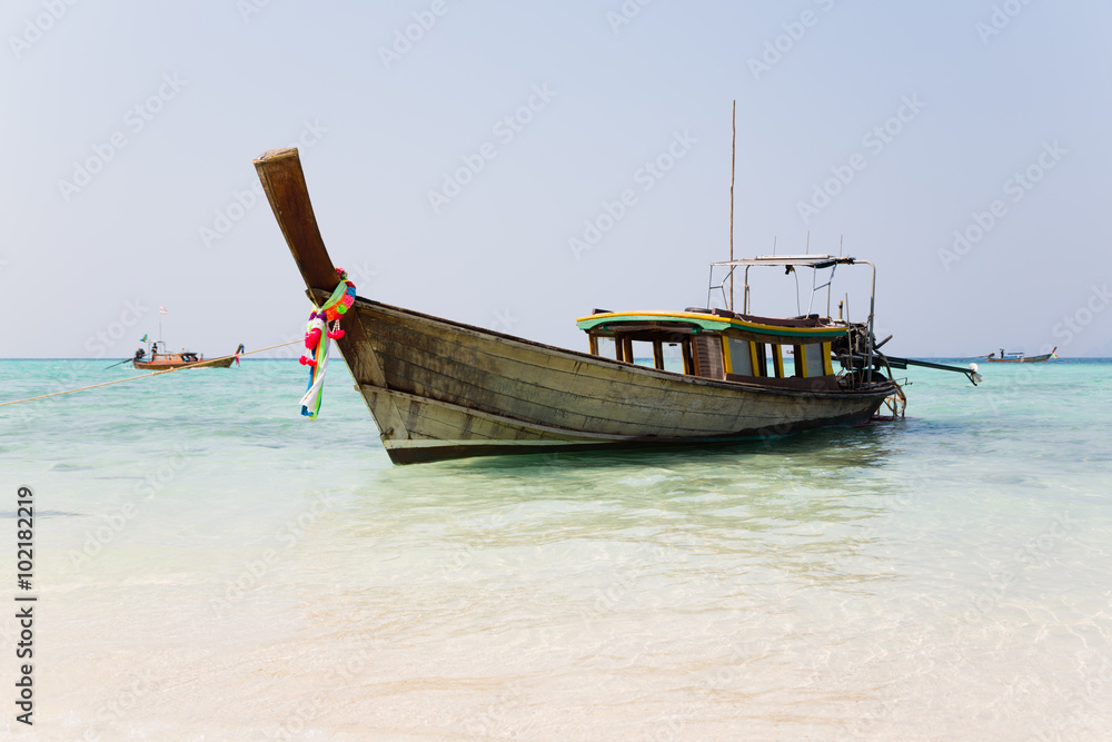 Thai boat cruise on the coast of the Bamboo island, Thailand