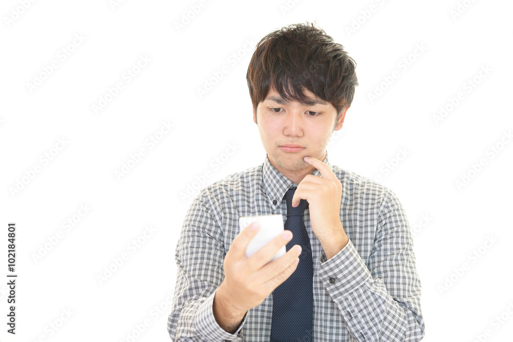 不安な表情のビジネスマン