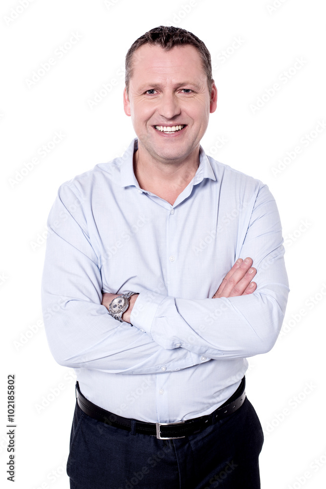 Smiling man posing to camera Smiling man posing to camera