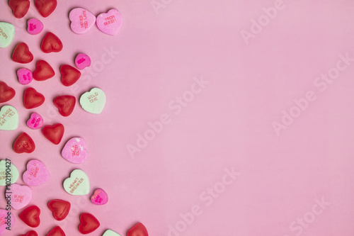 Pink and Red Candy Valentine's Day Conversation Hearts on Pastel