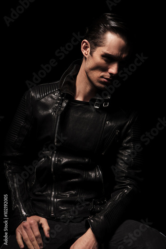 portrait of serious biker in black leather jacket © Viorel Sima