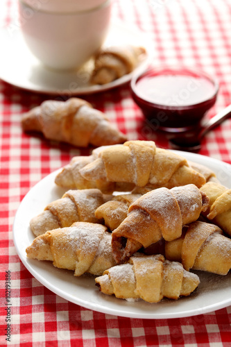 Fresh homemade croissants on a red napkin
