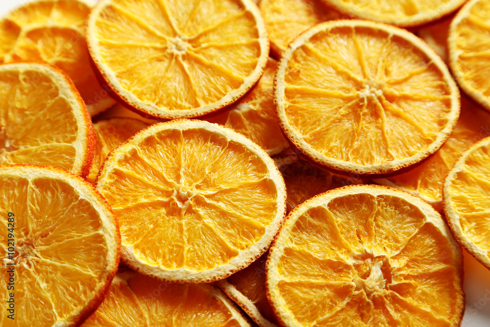 Dried orange slices background, close up Dried orange slices background, close up