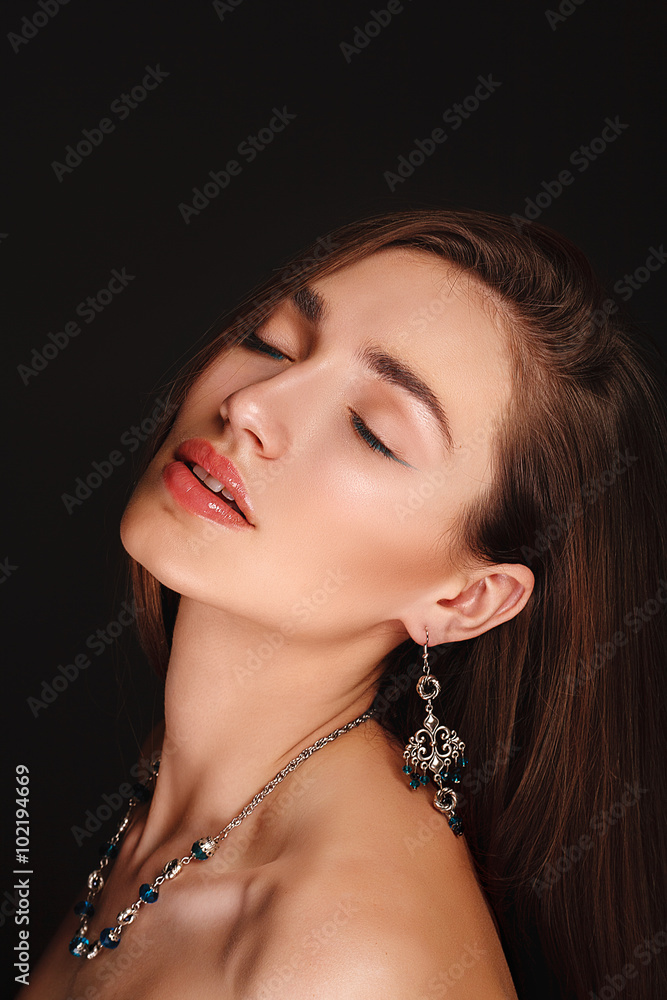 Sensual glamour portrait of beautiful young girl
