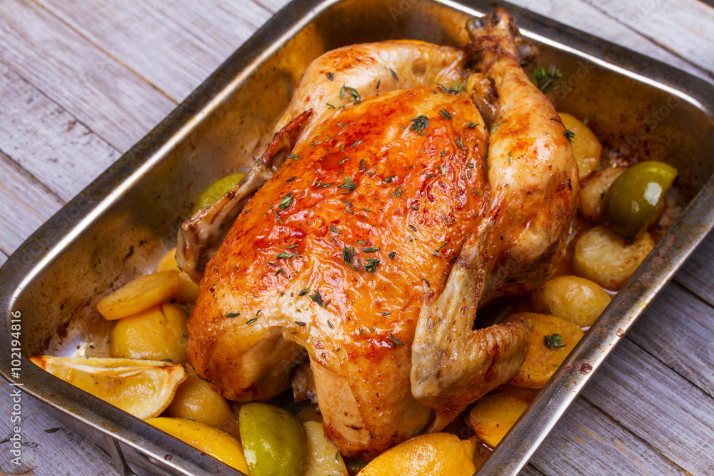 Fototapeta premium Chicken with Lemon, Lime, Potato and Thyme