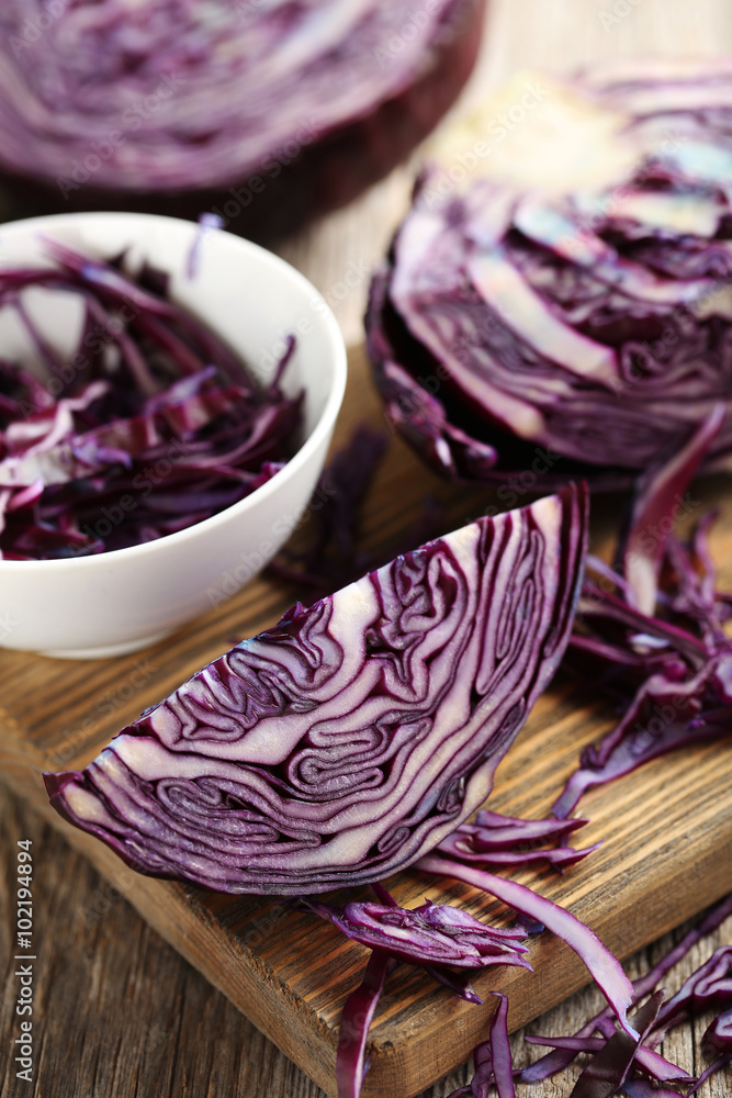 Ripe red cabbage on a grey wooden table Ripe red cabbage on a grey wooden table