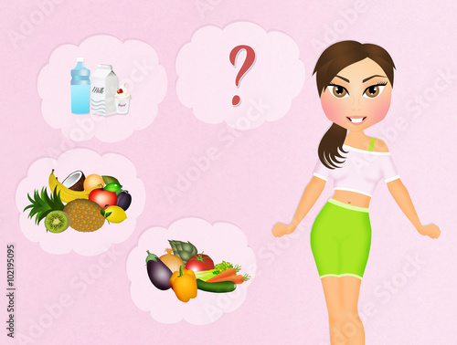 sporty girl with variety of healthy foods