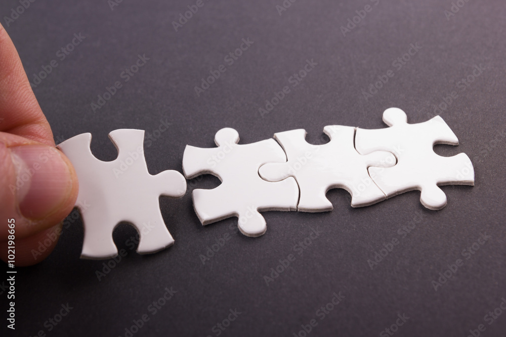 Obraz premium Missing jigsaw puzzle pieces. Business concept. Compliting final task