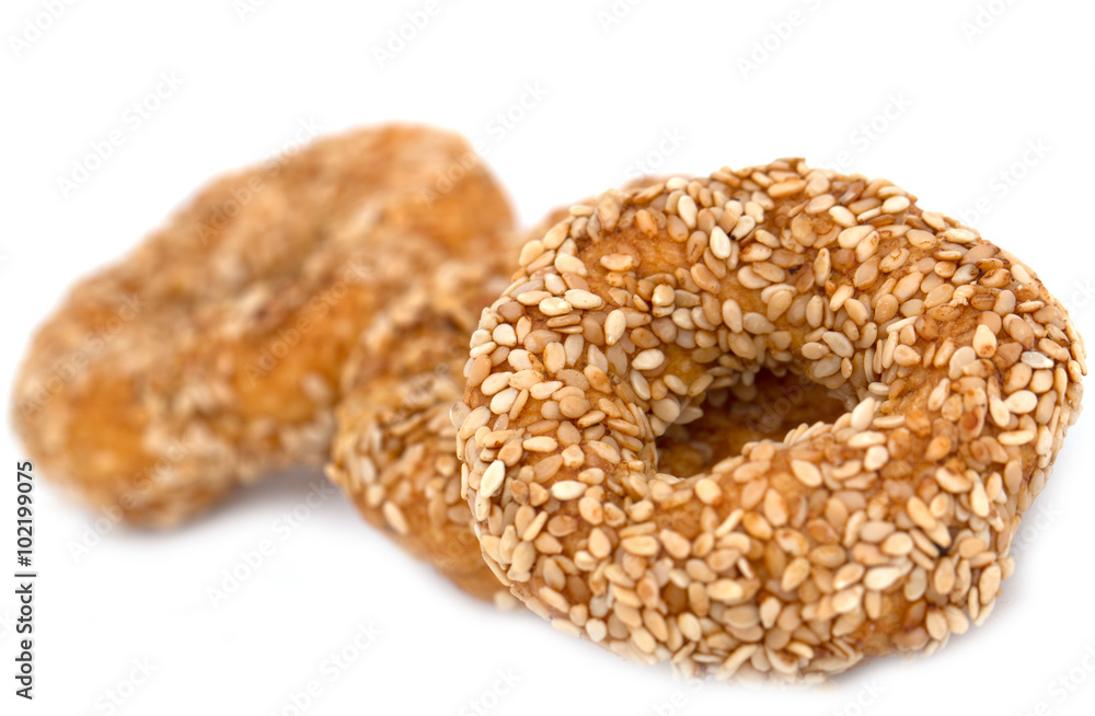 cookies with sesame seeds on a white background