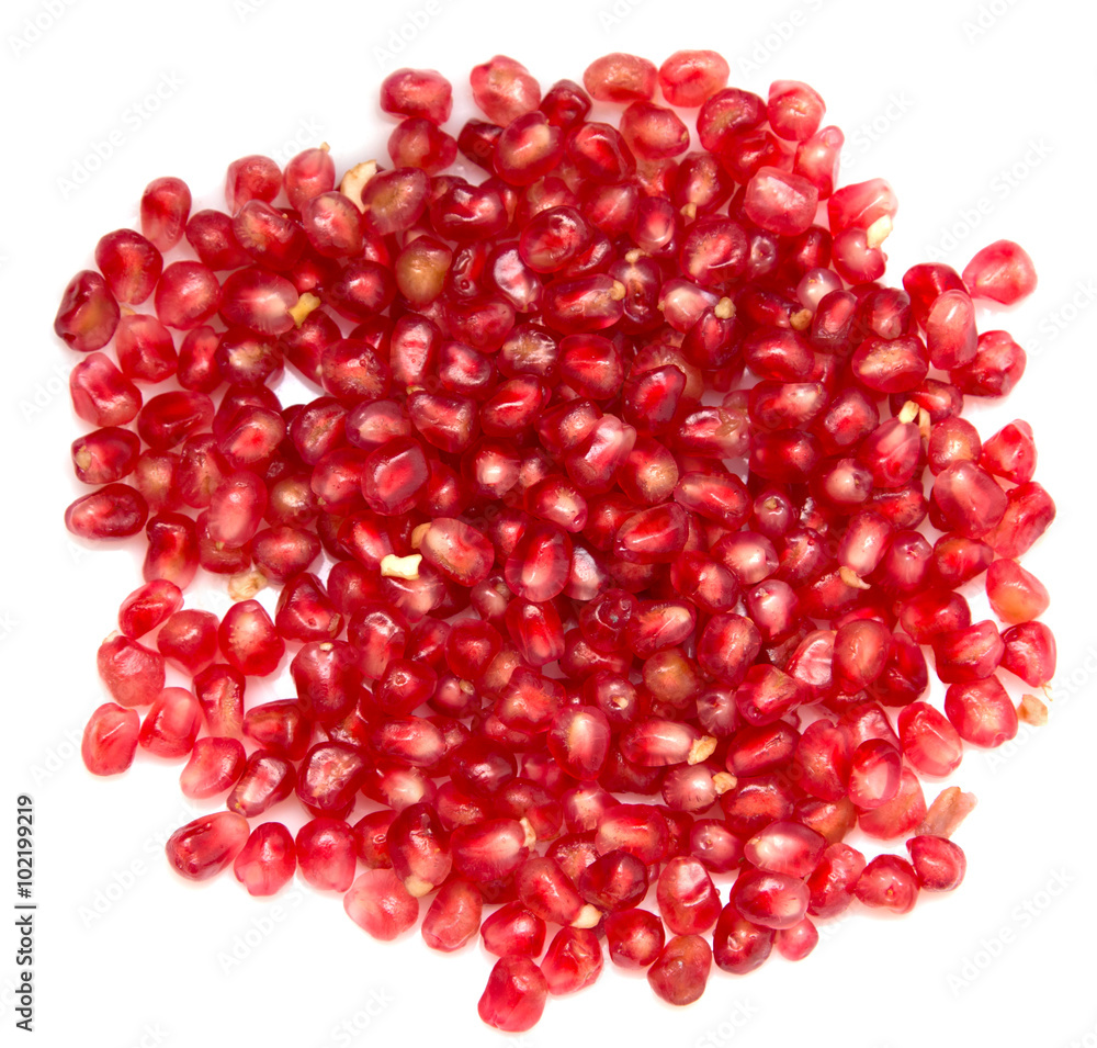 pomegranate seeds on a white background pomegranate seeds on a white background