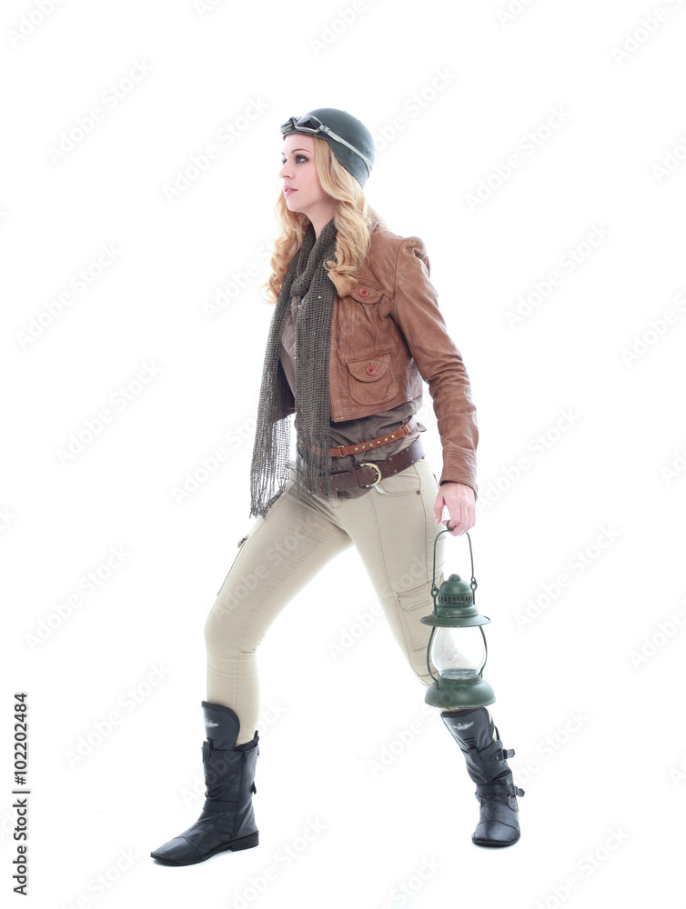 young blonde woman in a steampunk outfit, action hero pose. isolated on white background. young blonde woman in a steampunk outfit, action hero pose. isolated on white background.