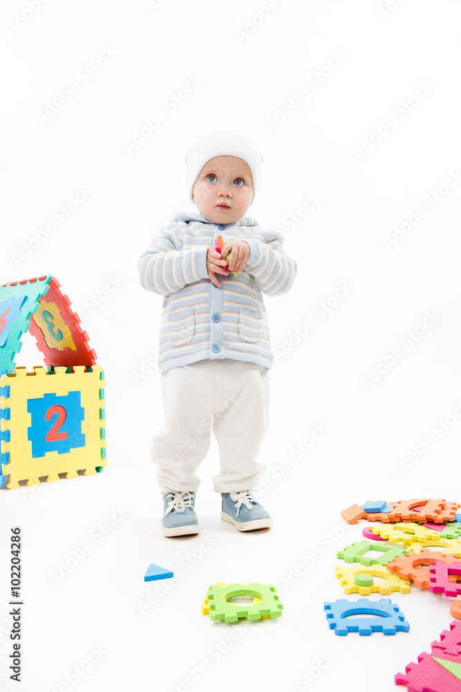 little child baby boy playing with puzzles little child baby boy playing with puzzles
