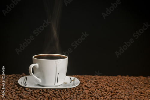 Hot coffee with coffee grains