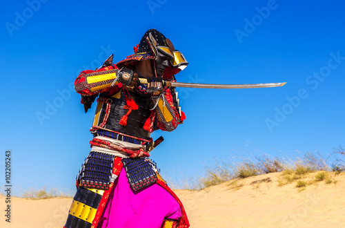 Samurai with a sword in an attack. warrior