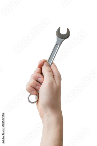 Caucasians man's hand holds spanner or wrench. Maintenance conce