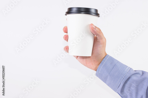 Officer handle a white coffee cup