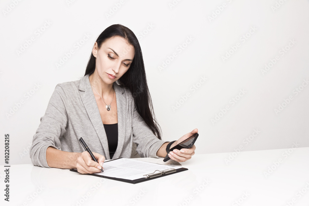 Portrait of a business woman with binder Portrait of a business woman with binder