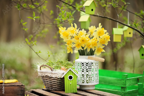 Easter decoration with spring flowers, narcissus blooms. Spring