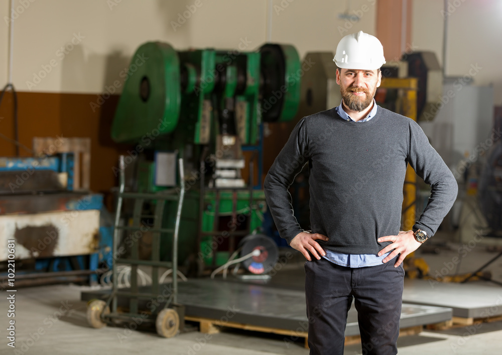 Businessman working in factory Businessman working in factory
