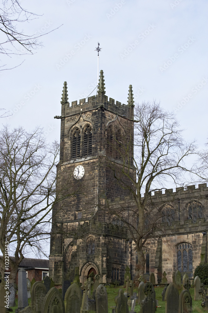 Detail of a typical English church showing clock tower