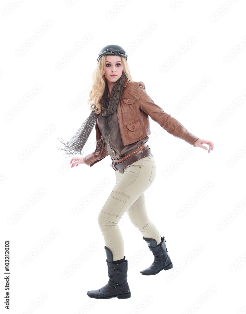 young blonde woman in a steampunk outfit, action hero pose. isolated on white background. young blonde woman in a steampunk outfit, action hero pose. isolated on white background.