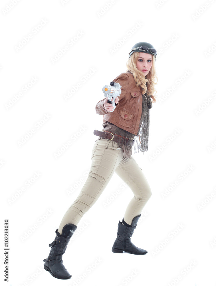 young blonde woman in a steampunk outfit, action hero pose. isolated on white background. young blonde woman in a steampunk outfit, action hero pose. isolated on white background.