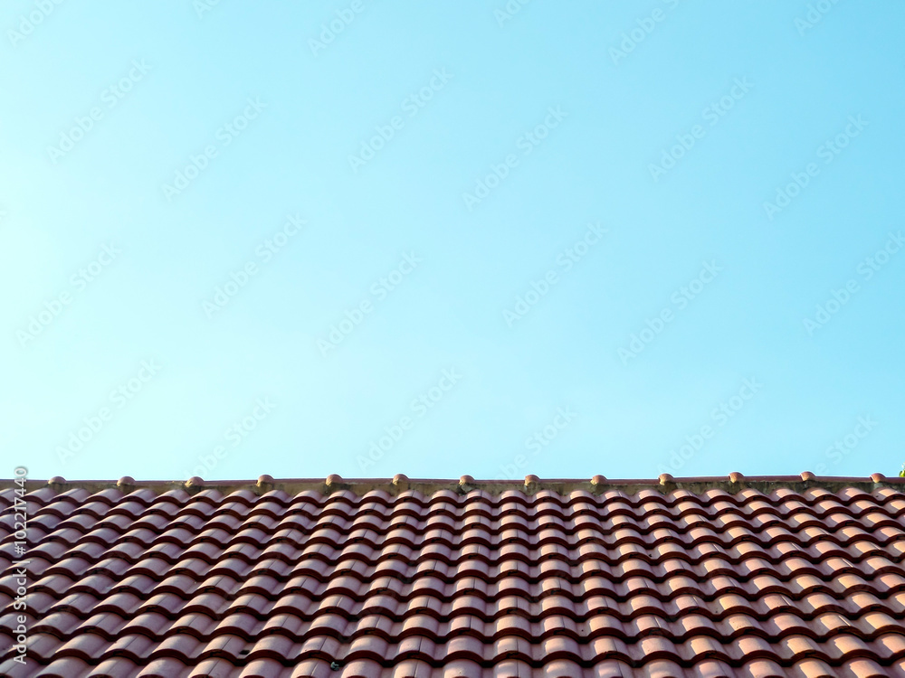Naklejka premium Roof surface and blue sky