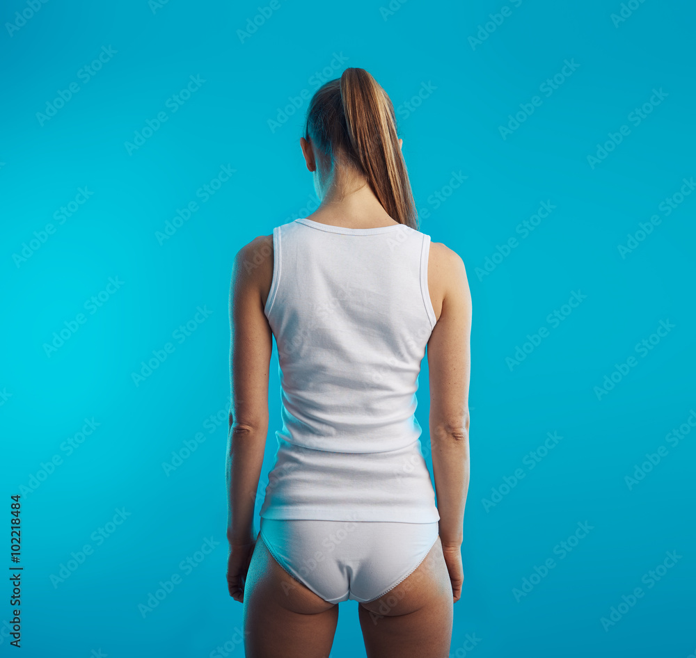 Slimming and beauty concept. Young sporty female in cotton underwear with  perfect healthy body. Stock Photo