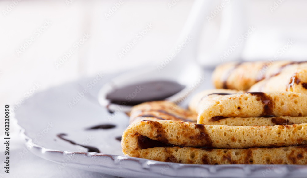 Pancakes with chocolate sauce.selective focus. Pancakes with chocolate sauce.selective focus.