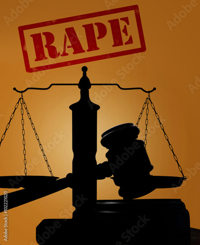Court gavel with scales with Rape text