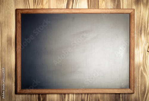 New light wooden burned texture with chalk board for background.
