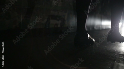 Footballer walking along corridor to match
