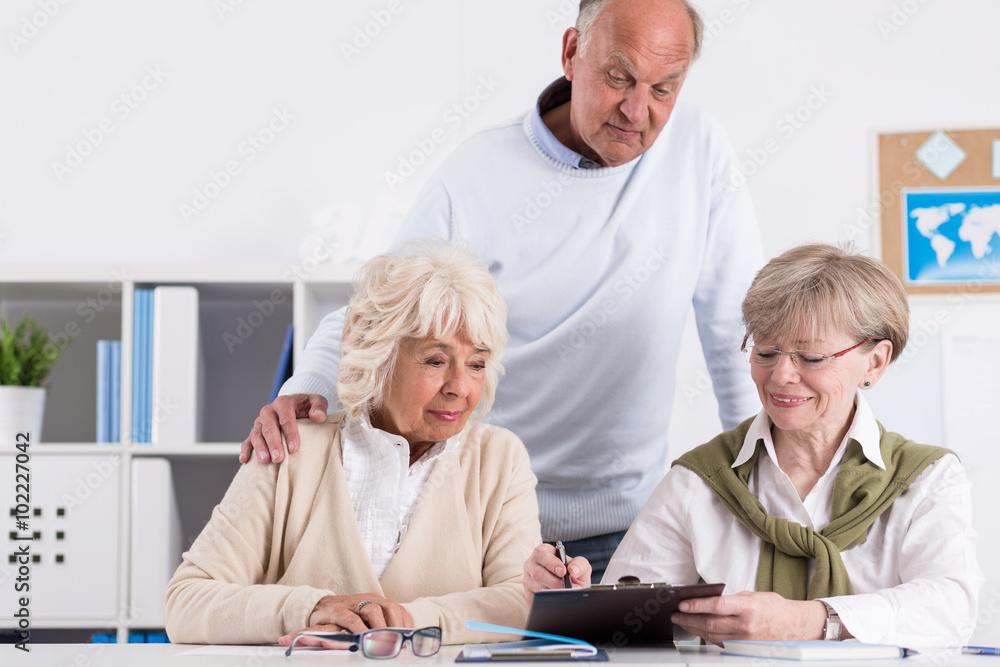 Fototapeta premium Explaining problem to fellow students