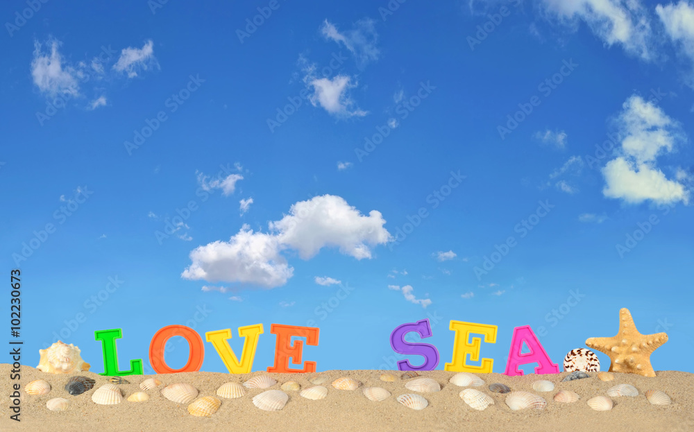 Love sea letters on a beach sand