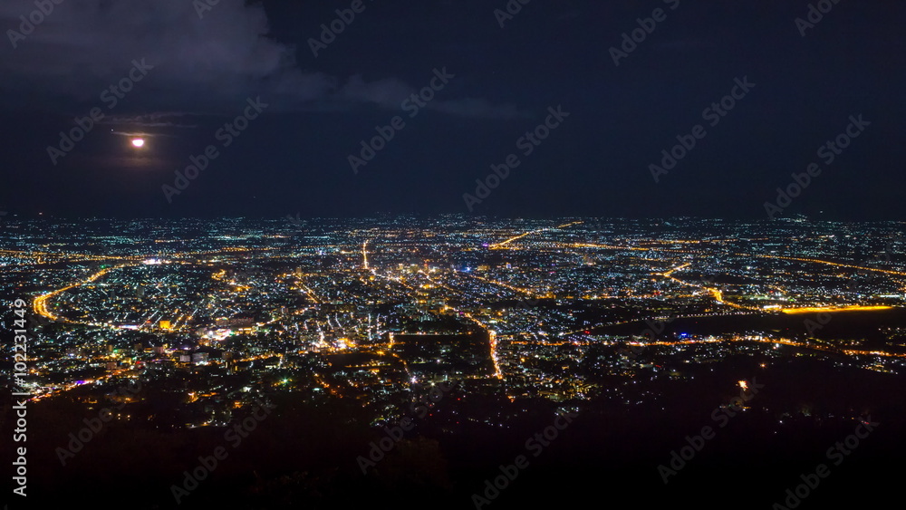 New Year Celebration Many Fireworks Over CityScape And Moonrise Of Chiang Mai, Thailand (time lapse - zoom in) New Year Celebration Many Fireworks Over CityScape And Moonrise Of Chiang Mai, Thailand (time lapse - zoom in)