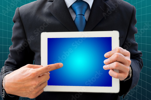 Wallpaper Mural Businessman using tablet for presentation Torontodigital.ca