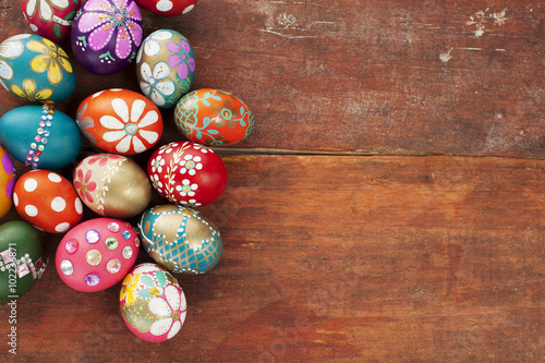 Colourful easter eggs old brown wooden board
