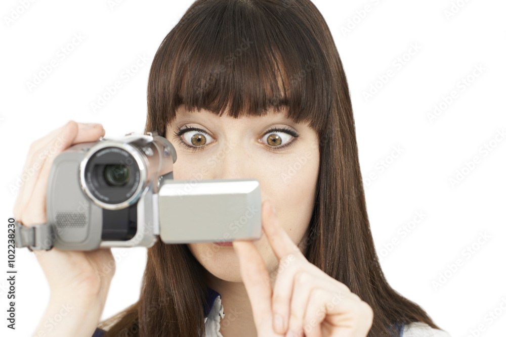 Woman Recording On Portable Video Camera Woman Recording On Portable Video Camera
