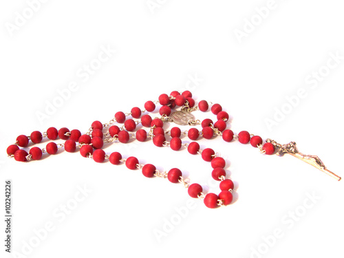 Red rosary made of rose's petals