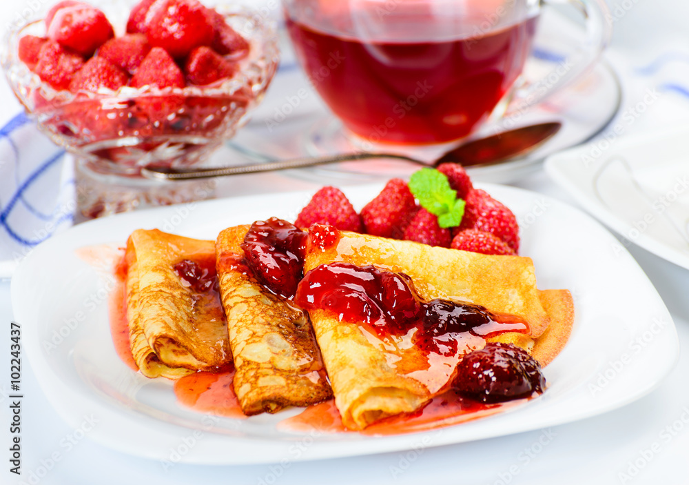 Pancakes with strawberry jam. Pancakes with strawberry jam.