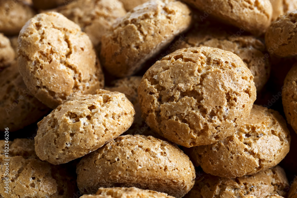 Macro detail of many Italian amaretti biscuits with selective f Macro detail of many Italian amaretti biscuits with selective f