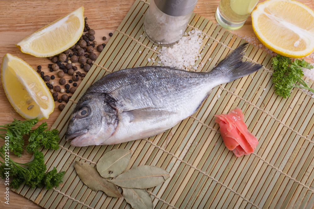 fresh fish with lemon, butter, salt and pepper fresh fish with lemon, butter, salt and pepper