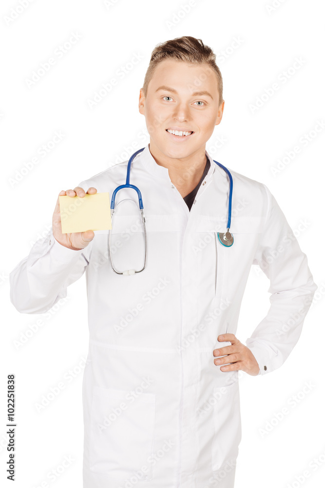 Medical doctor with stethosccope over the shoulder holding a sma Medical doctor with stethosccope over the shoulder holding a sma